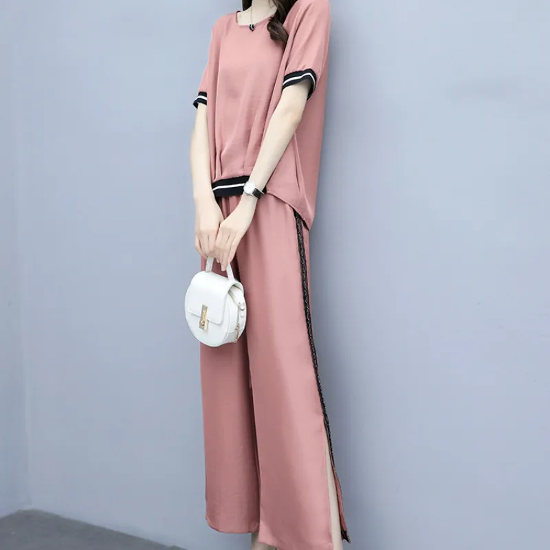 

Новая летняя мода показывает тонкие широкие брюки темперамент случайные с коротким рукавом из двух частей набор женский