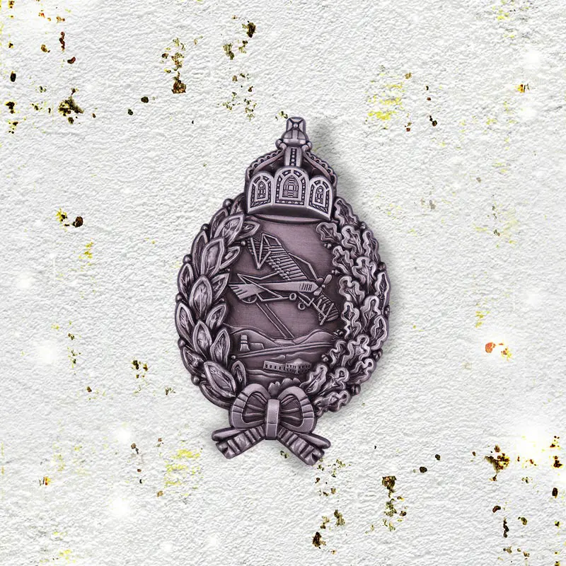 Значок немецкого военного самолета символизирующий приединение победы и