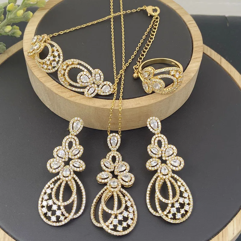 

Lanyika Fashion Jewelry Set Luxury Petal Zirconia Micro Pave Necklace with Earrings, Bracelet and Ring for Woman Banquet Gifts