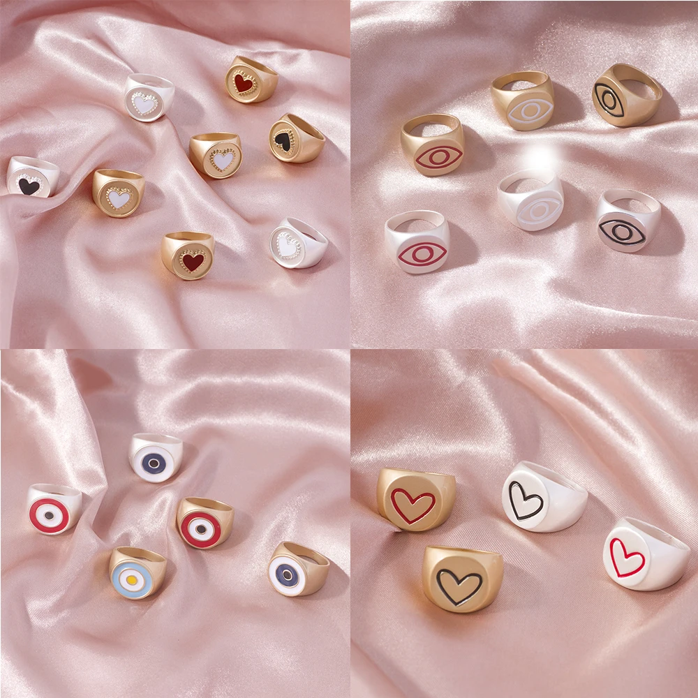 

European and American fashion street clap hand jewelry ring versatile multi-color peach heart eye circle dripping oil Woman stai