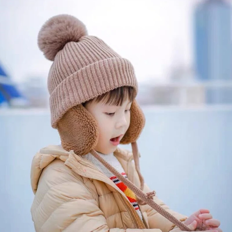 2-8 Years Winter Children's Knitted Hat Fashion Boy And Girl Baby Warm Ear Cap Cute Wool Ball Knitted Woolen Hat enlarge