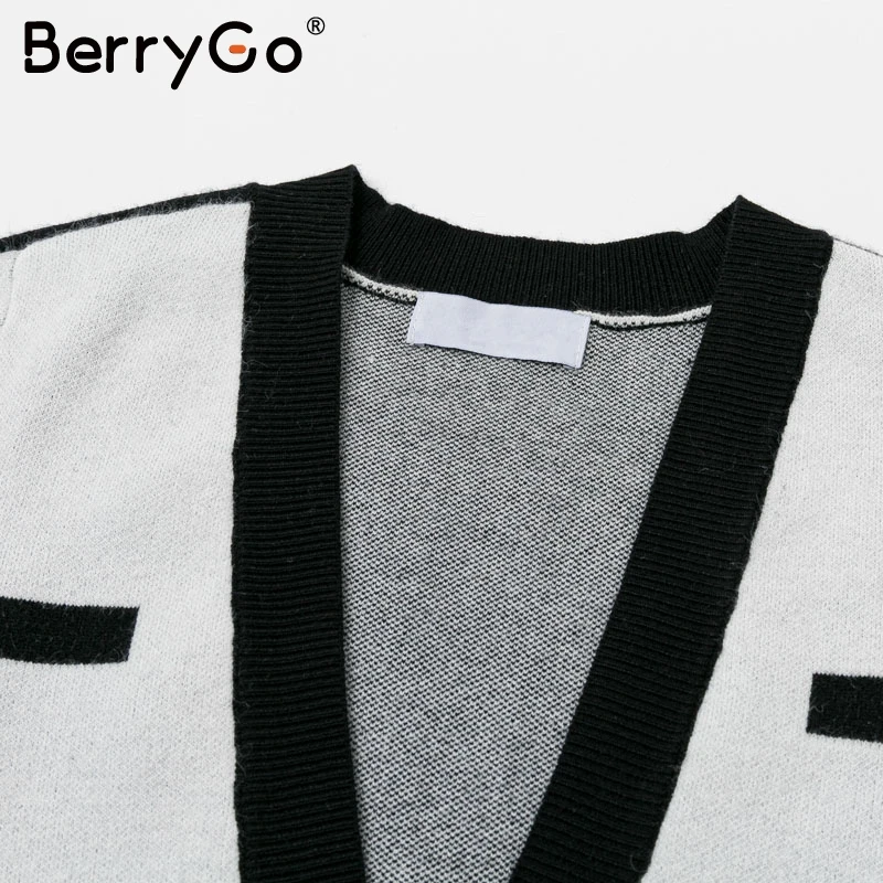 BerryGo Sexy v-neck women knitted dress Vintage winter lady club streetwear mini dress Party style autumn bodycon sweater dress