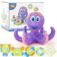 floating purple happy octopus with 5 circular interactive bath toys throw rings to toss