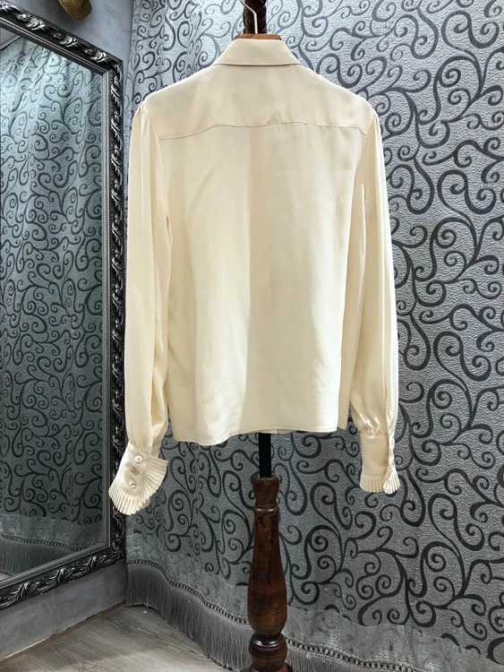 

2020 autumn and winter new women's lapel pleated wood ear stitching decorative solid color long-sleeved shirt 1211