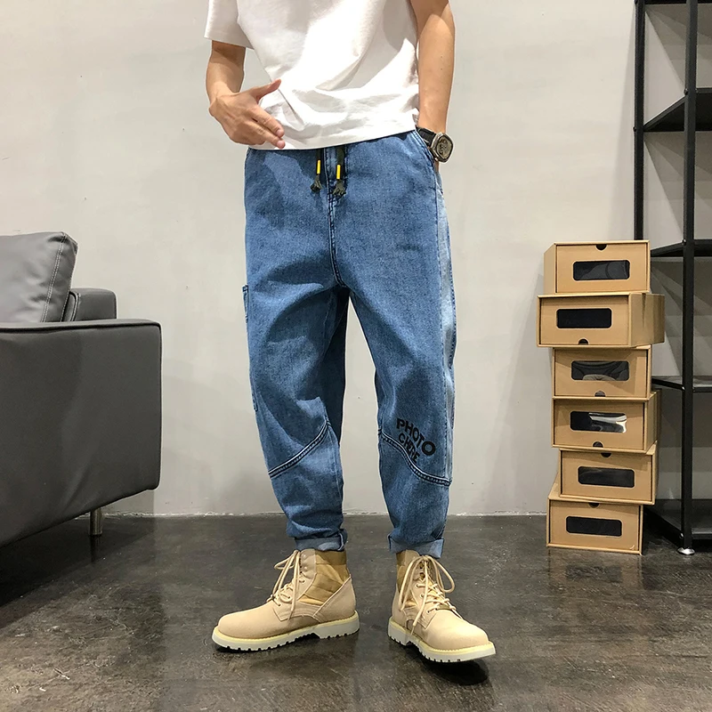 

2021 Seasons Light Blue Lace Stitching Multi-Pocket Letters Harlan Feet 9 Points Jeans Men's Japanese Trend