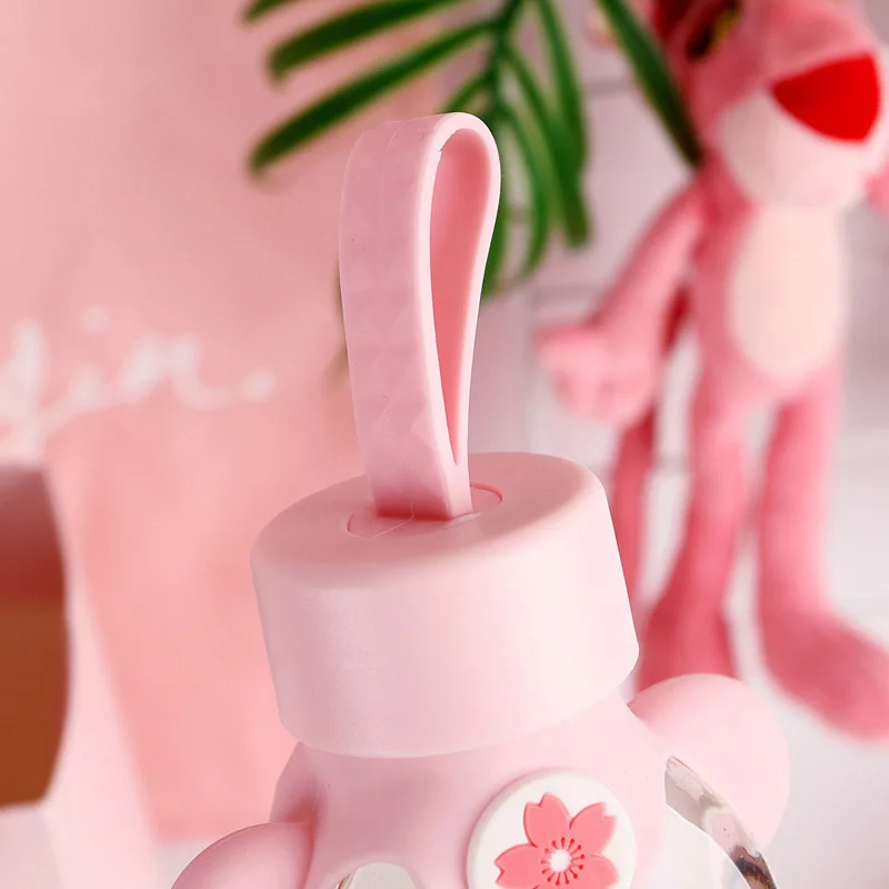 

New Cute Glass Bottle Creative Cartoon Pink Cherry Blossom Glass Water Cup With Silicone Cover For Women Girl Drink Bottles