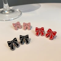 2020 new fashion trend korean christmas pearl bow earrings female red autumn and winter retro small fragrance earrings