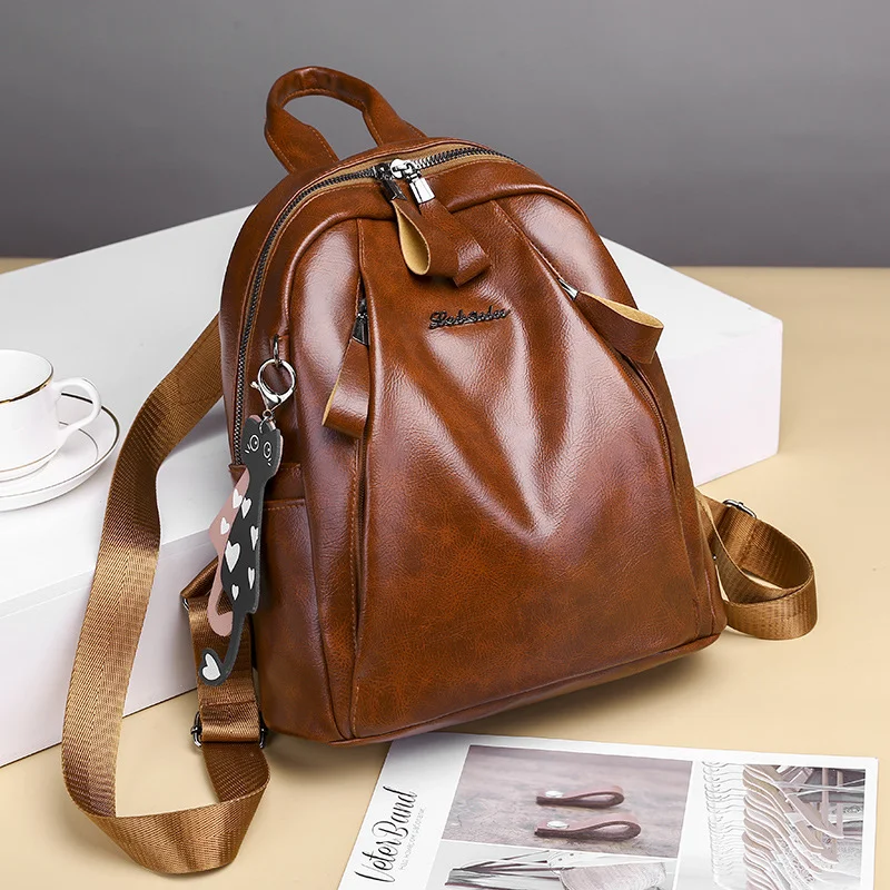 

Fashion women's backpack 2020 new solid color retro simple soft leather women's bag multi functional college style travel bag