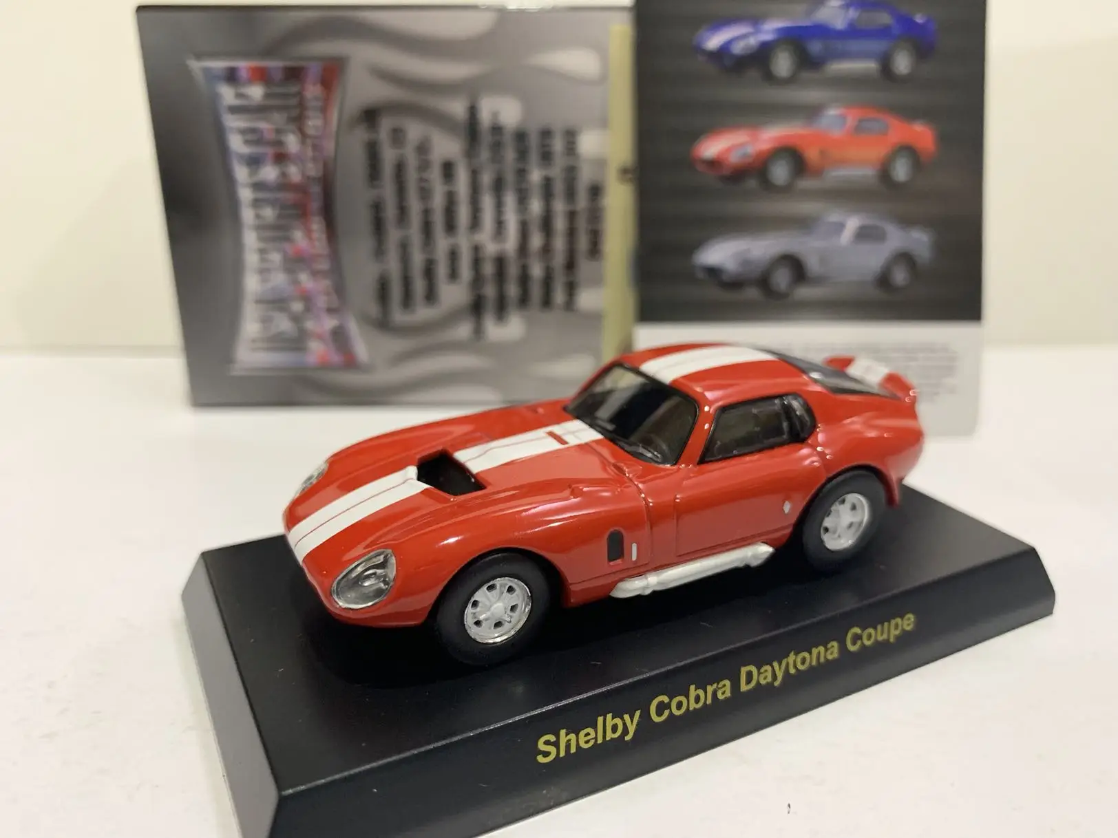 

Модель тележки из литого сплава 1:64 KYOSHO Shelby Cobra Daytona coupe