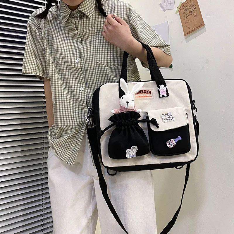 

Lovely large-capacity schoolbag female 2022 new Korean class shoulder bag ins Japanese Harajuku Messenger bag shoulder bag.