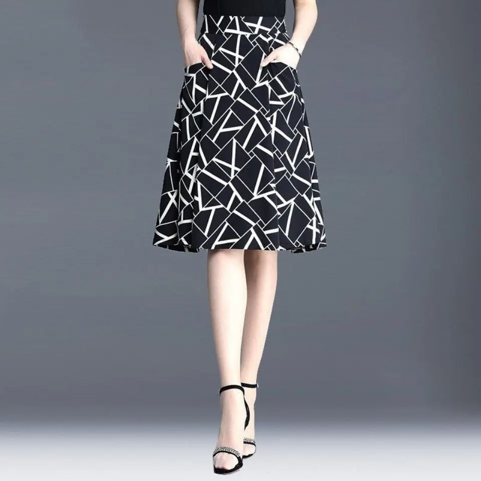

Half length skirt women's summer loose A-line bag hip skirt middle skirt new pocket show thin Plaid high waist medium length ski