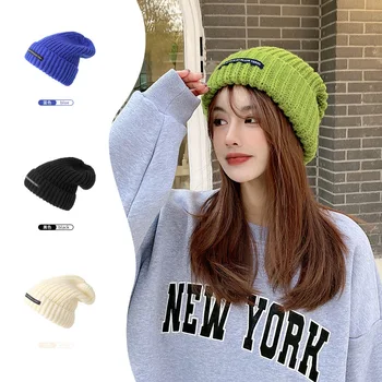Korean version of autumn and winter letter cloth label wool hat wild trend pullover cold hat thickened warm ear protection hat