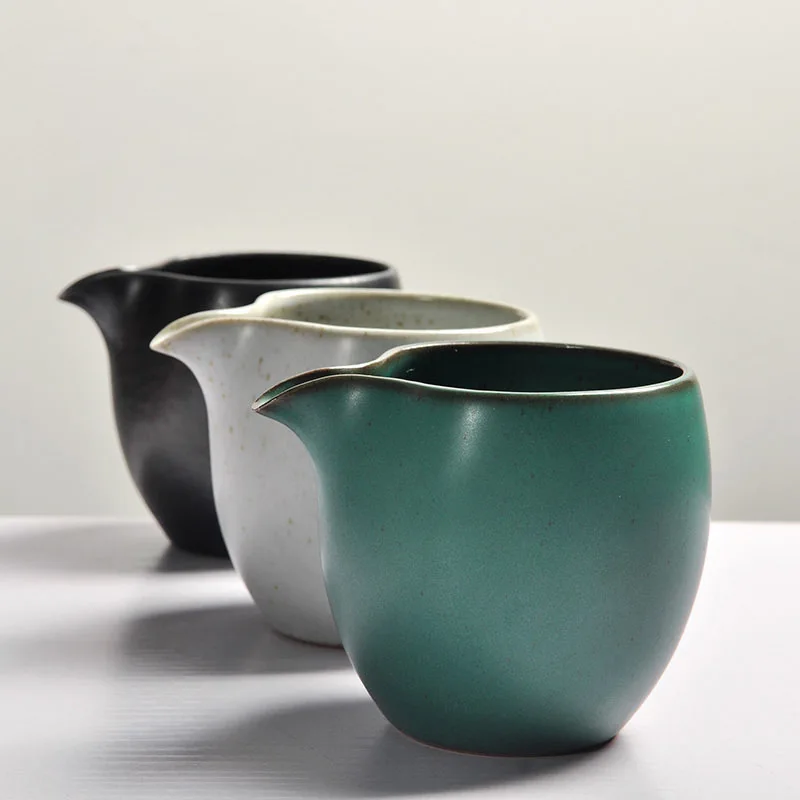 

Japanese stoneware tea set fair cup Dehua ceramic Kung Fu tea set tea sea antique handmade kiln variable male cup tea separator