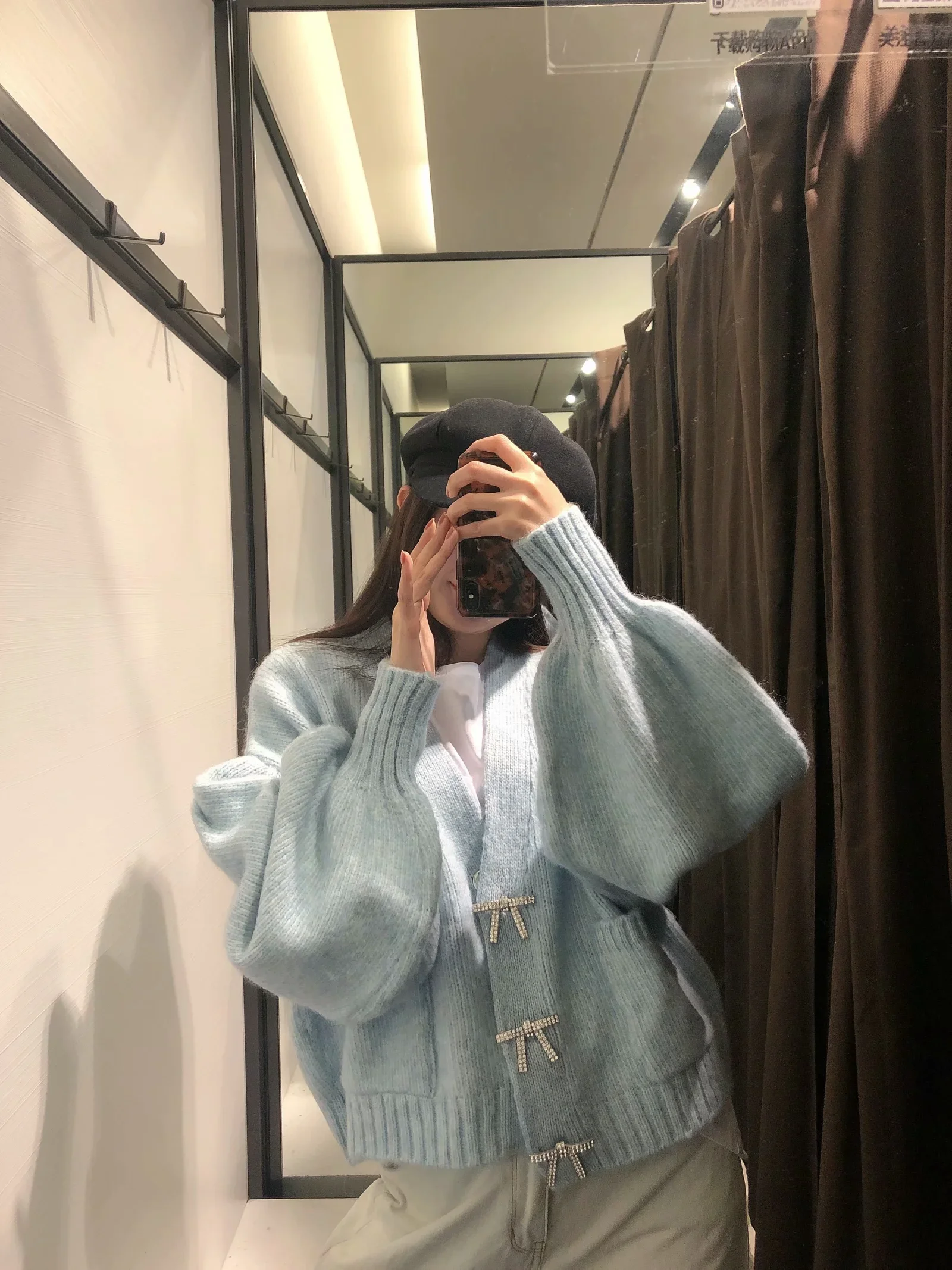 

Bejeweled bow-button coat