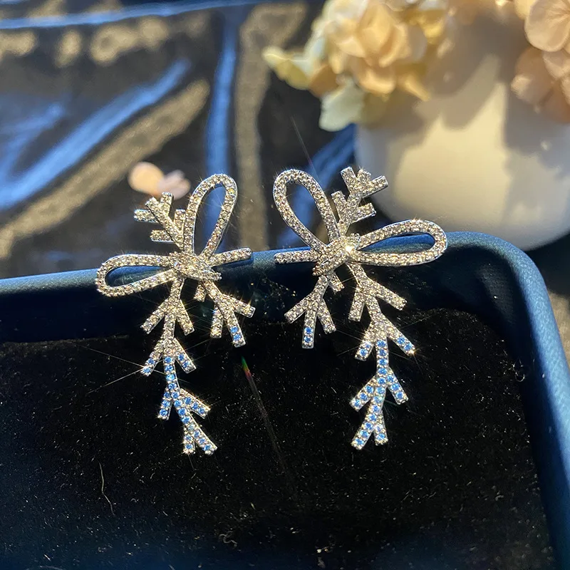 

Ribbon snow earrings female gradient blue bow stud earrings star with the same paragraph Christmas winter jewelry wholesale