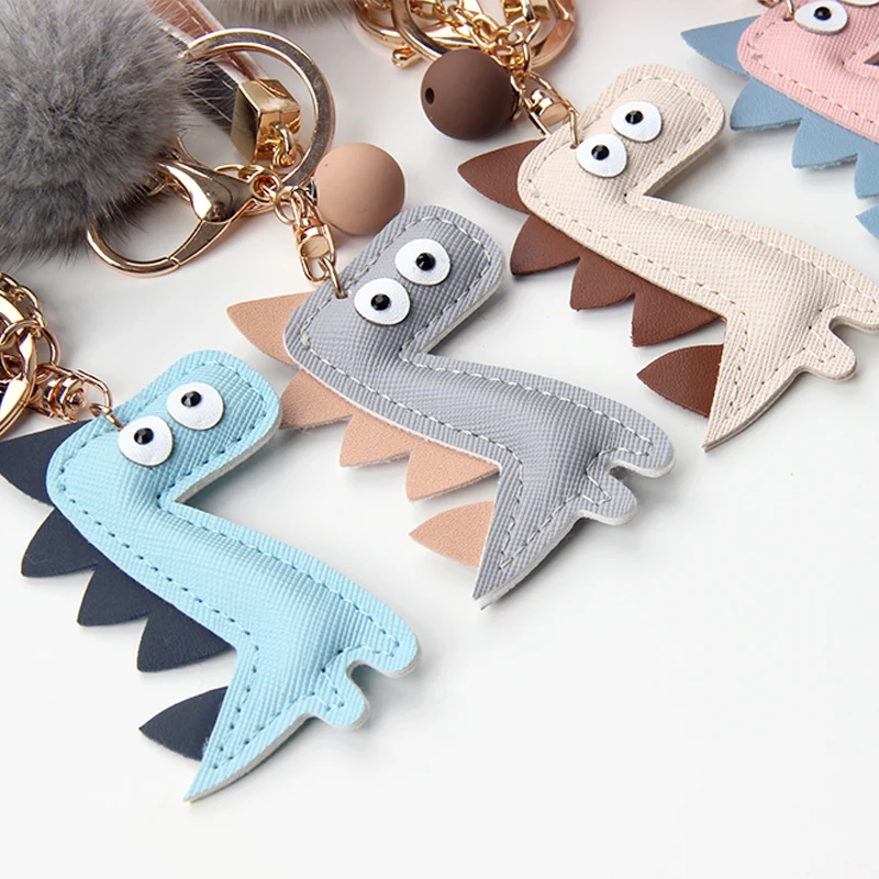 Милый картонный брелок для ключей автомобиля с помпоном из меха динозавра