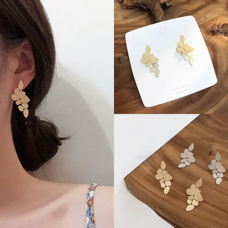 Цвета: золотистый серебристый Цвет металлическая форма листа свисающие серьги