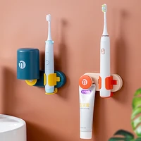 gravity induction electric toothbrush holder bathroom creativity wall mounted non marking bracket toothbrushing cup organizer