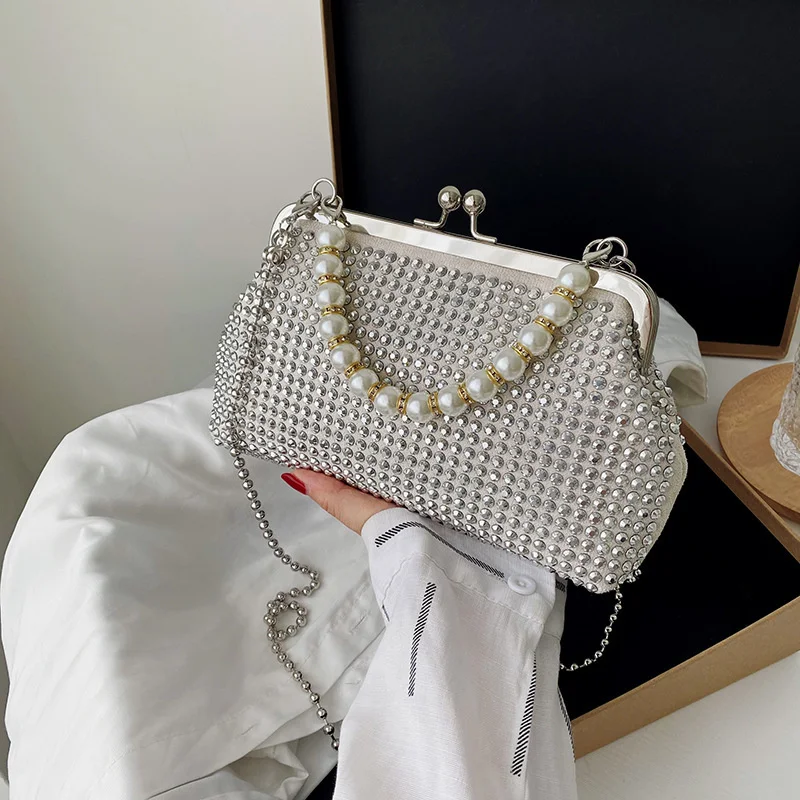 

Small fragrance pearl hand-held bag for women summer 2021 Korean fashion rivet personalized one shoulder chain messenger bag