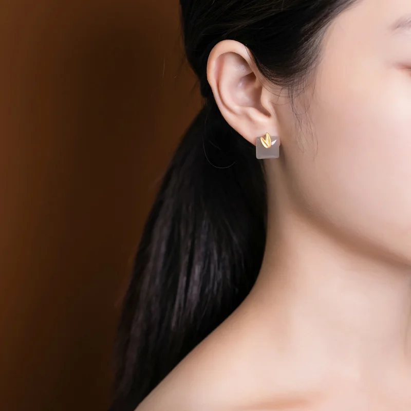 

Elegant Freshness S925 Pure Silver Gold-Plated Natural Hotan yuyanzi Ancient Style Simple And Compact Bamboo Leaf Female Earring