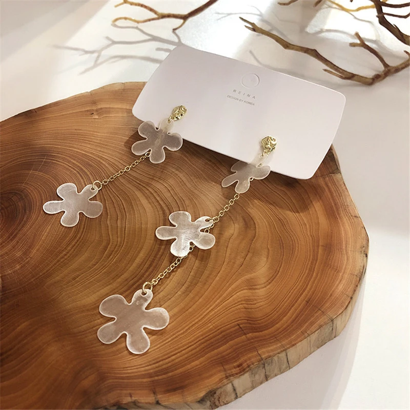 Женские асимметричные серьги подвески длинные в виде ракушек цветов и кисточек