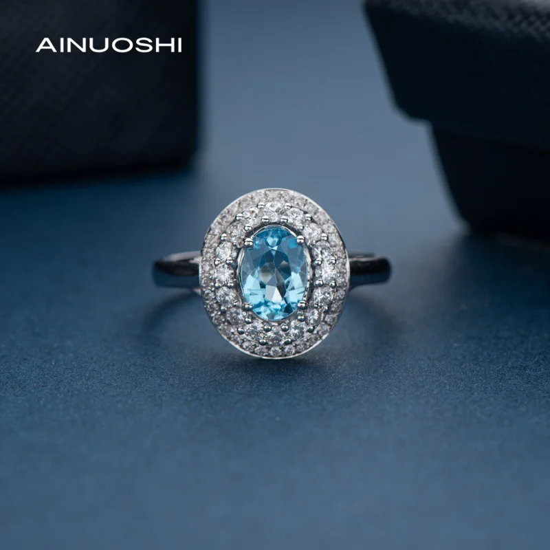 

AINUOSHI Elegant Gemstone Ring 18K White Gold Halo Natural 0.896ct Oval Blue Topaz 0.462ct White Diamond Vintage Ring for Women