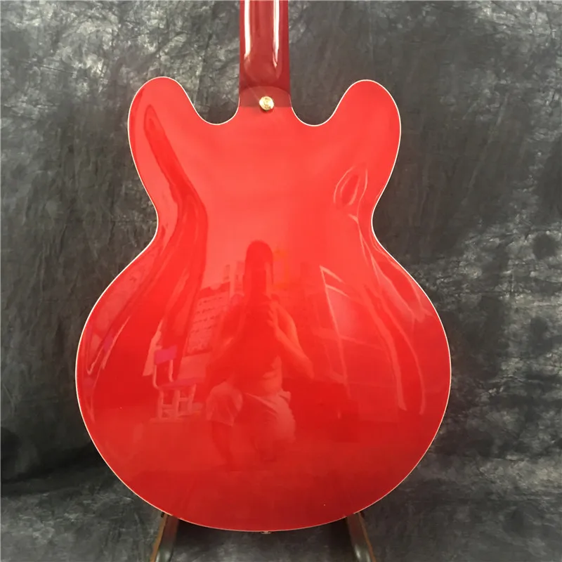 

High quality jazz electric guitar, red. Top quality, golden hardware