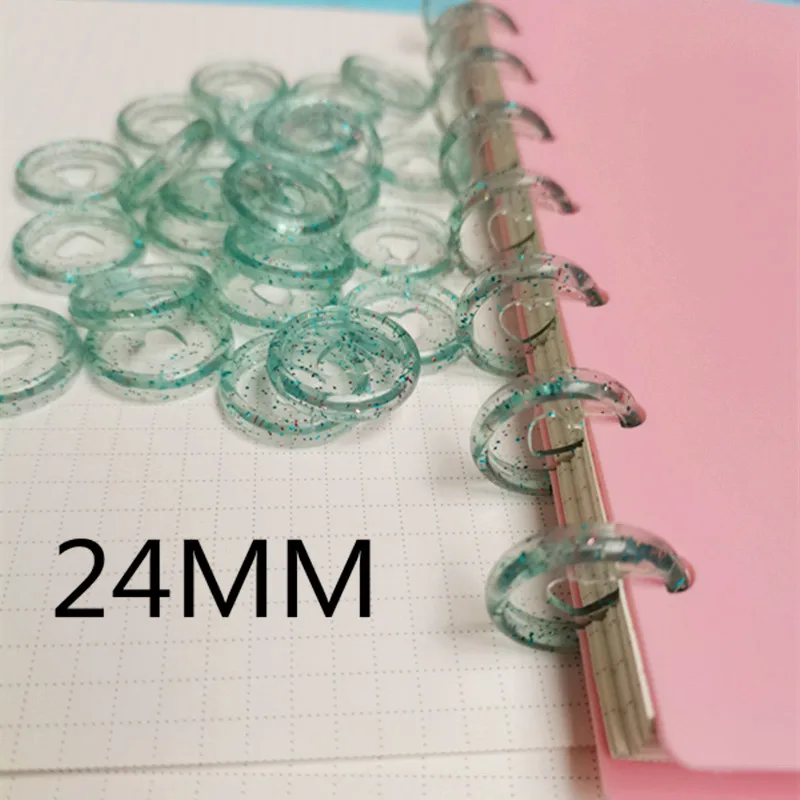 

Plastic binding ring 100PCS24MM transparent glitter sequin plastic love mushroom hole buckle loose leaf coil flip disc buckle