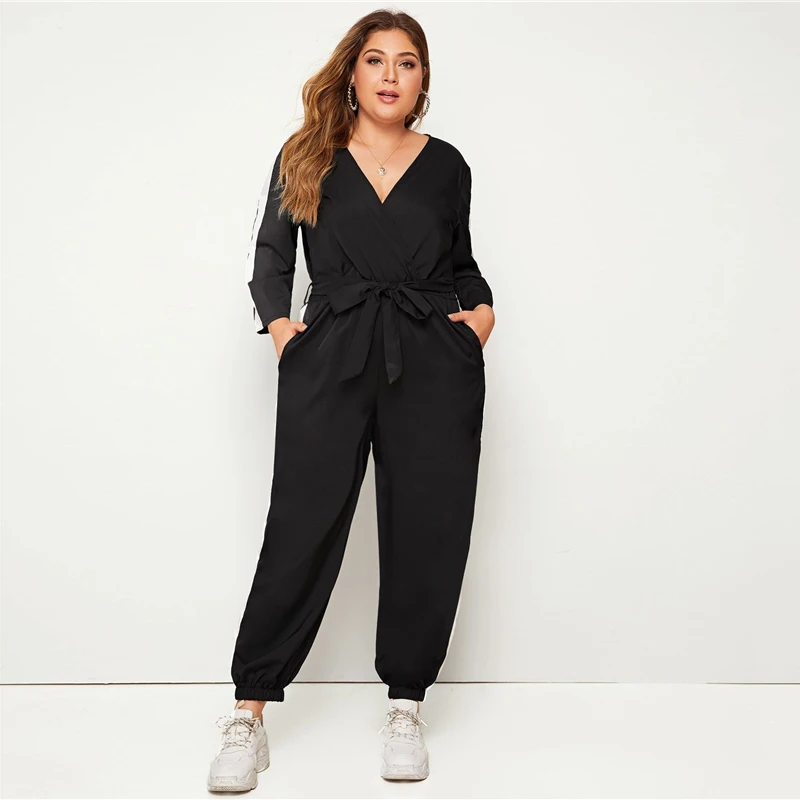 SHEIN плюс размер цветной блок Surplice передний комбинезон с поясом женский весенне-осенний Повседневный v-образный вырез длинный рукав спортивные длинные Комбинезоны