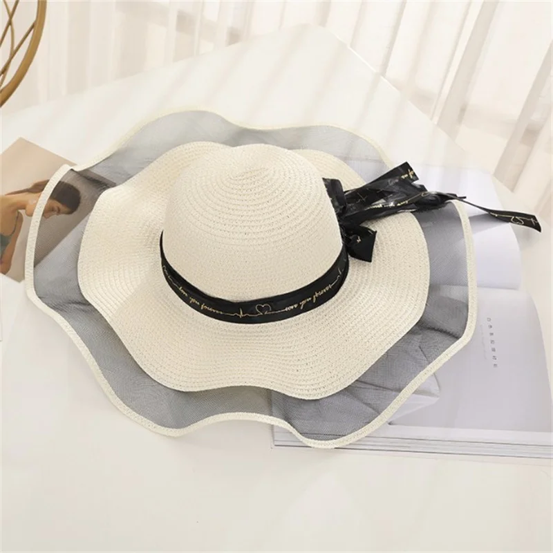 

Foldable Big Brim Floppy Girls Straw Hat Sun Hat With Bowknot Elegant Protection Shading Fashion Beach Caps For Women 2021