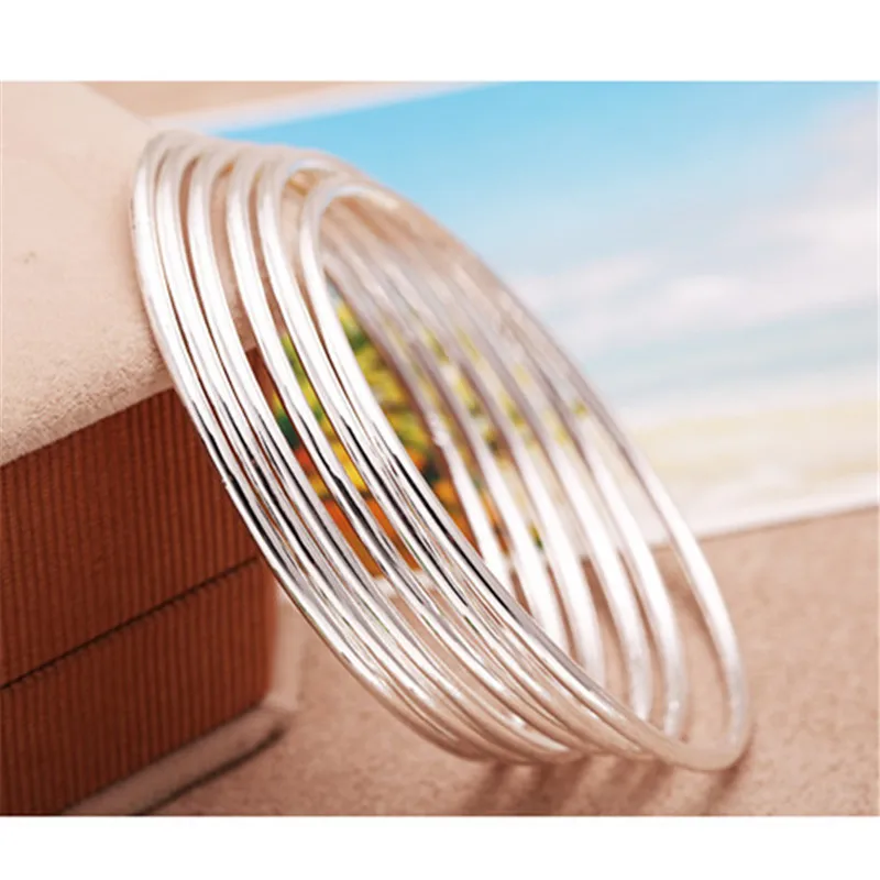 Простой браслет женский тонкий круглые в полоску можно комбинировать