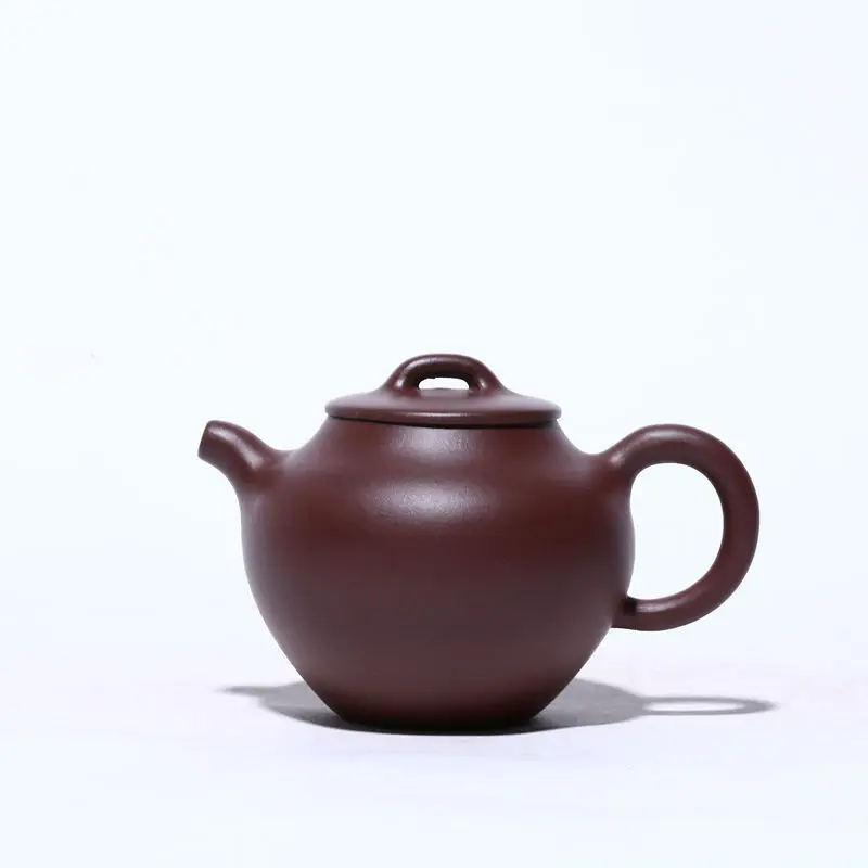 

Yixing raw mine aged purple clay teapot