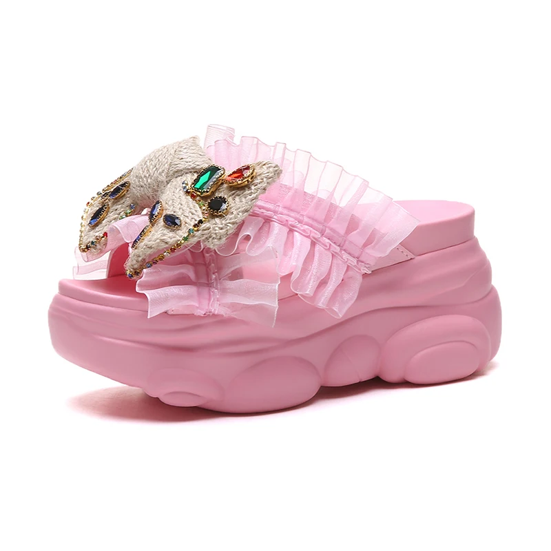 

Increased inner thick sole sweet bowknot ladies sports slippers summer fashion new rhinestone sandals outer wear non-slip.