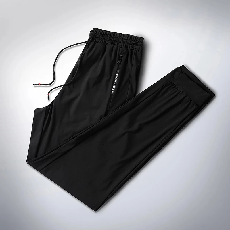 

Брюки мужские быстросохнущие из вискозы, дышащие свободные прямые штаны с поясом для фитнеса, облегающие эластичные модные штаны, лето-40