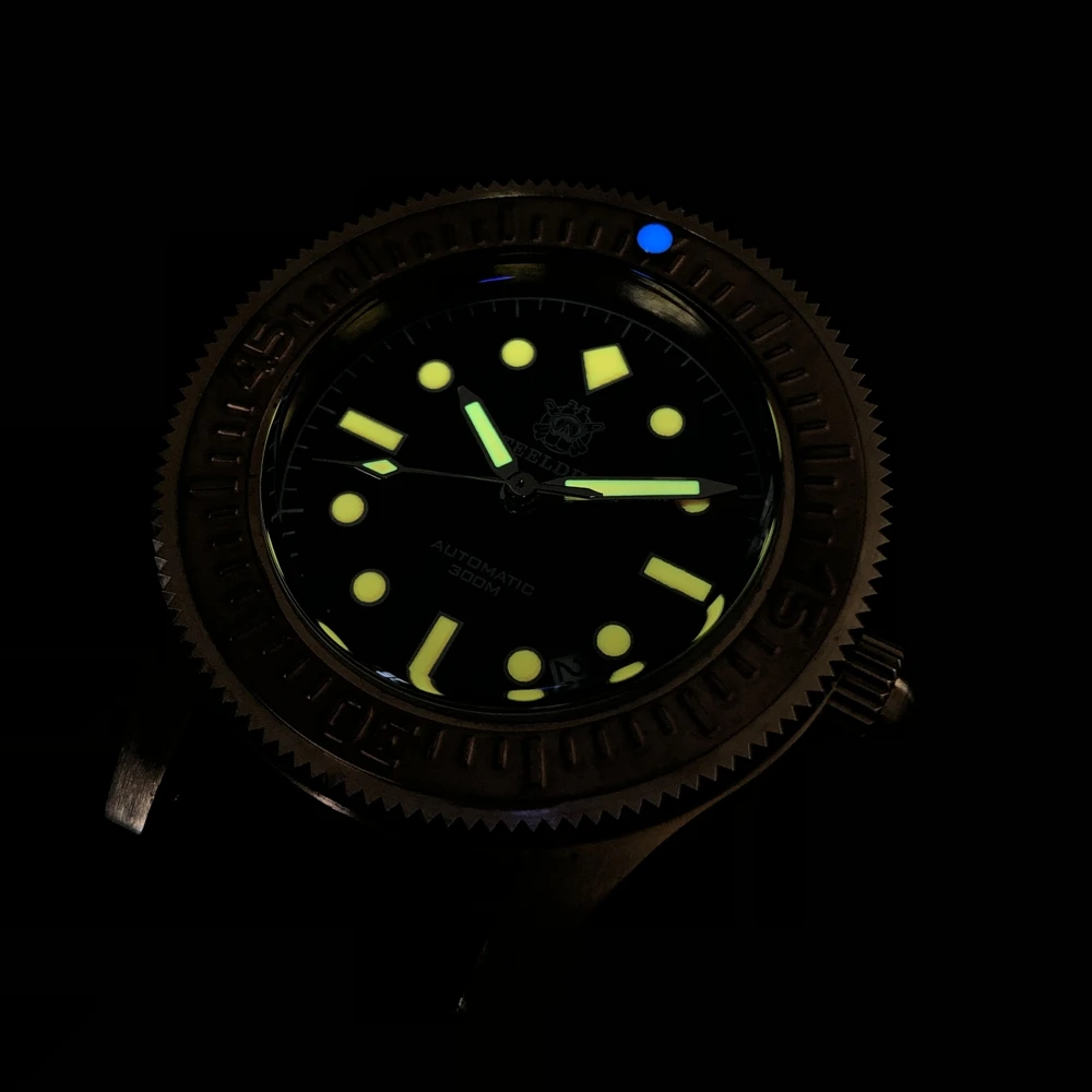 للبيع ساعة بحزام مطّاطي من Steeldave SD1952S حافظة بلون برونزي متين 300 متر مقاوم للماء من الياقوت الزجاجي ساعة غوص احترافية فائقة مضيئة أوتوماتيكية