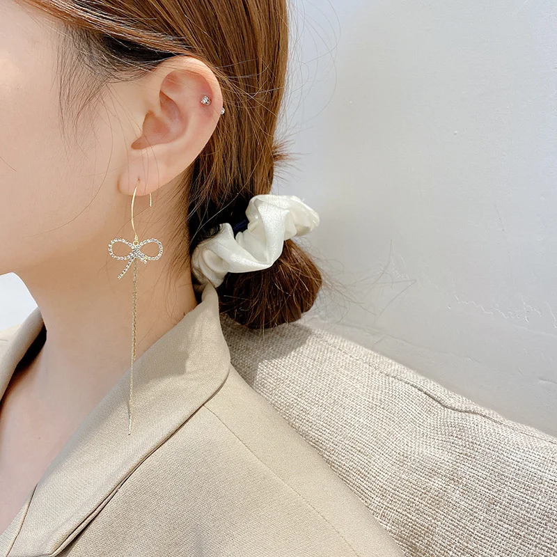 

Silver Needle Bow Long Tassel Asymmetric Ear 2021 Classic Limited Earring for Women Girls Luxurious Party