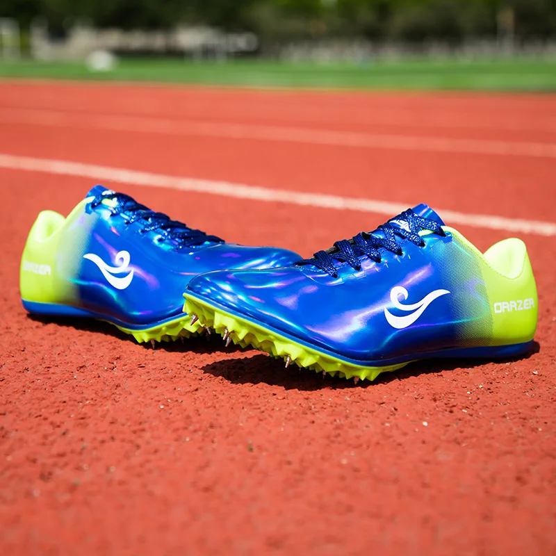 

Couples Track and Field Shoes Golden Spikes Shoes Athletics Men Spring Lightweight Male Running Nails Sneakers Race shoes
