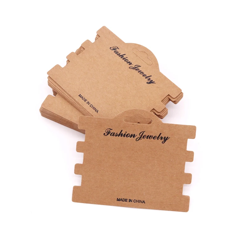 Карточка для упаковки резинок для волос, ювелирных изделий и бусин, выполненная из крафтовой бумаги, размером 10,5*8,5 см, с эластичным воротником.