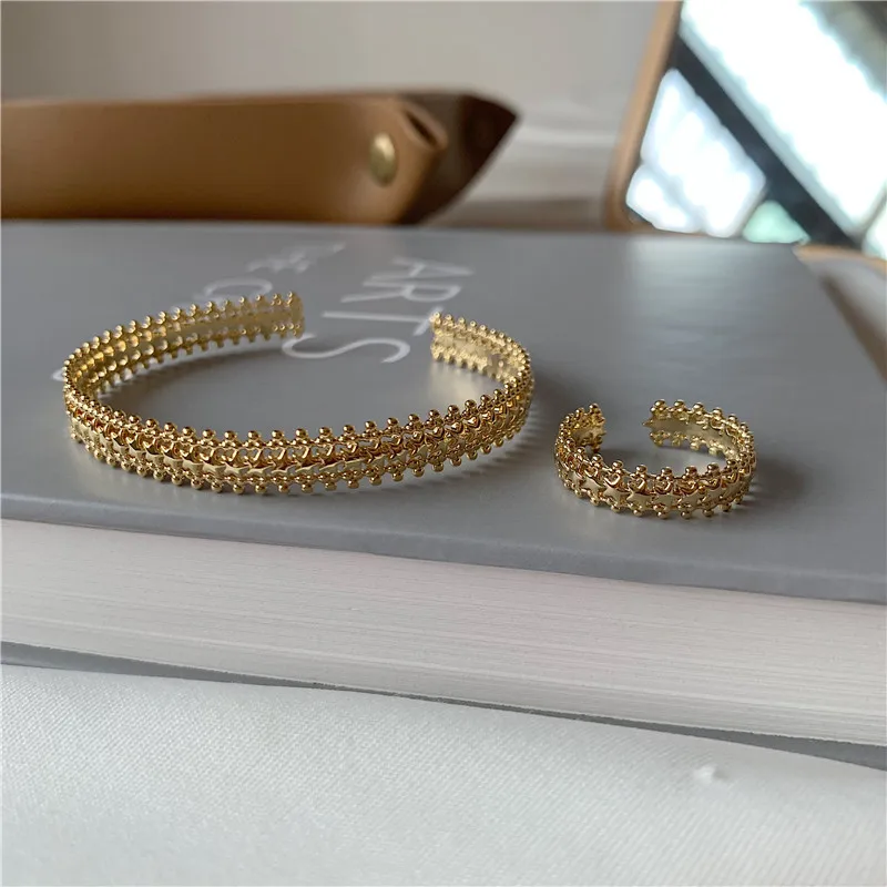 

High quality hollow five-pointed star gold Bangle ring set niche design sense opening ladies bracelet ring