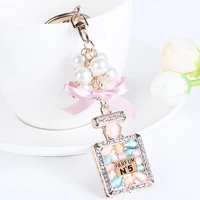 high quality women keychain fashion jewelry bag charm rhinestone opals keyring creative perfume bottle key chain ring wholesale