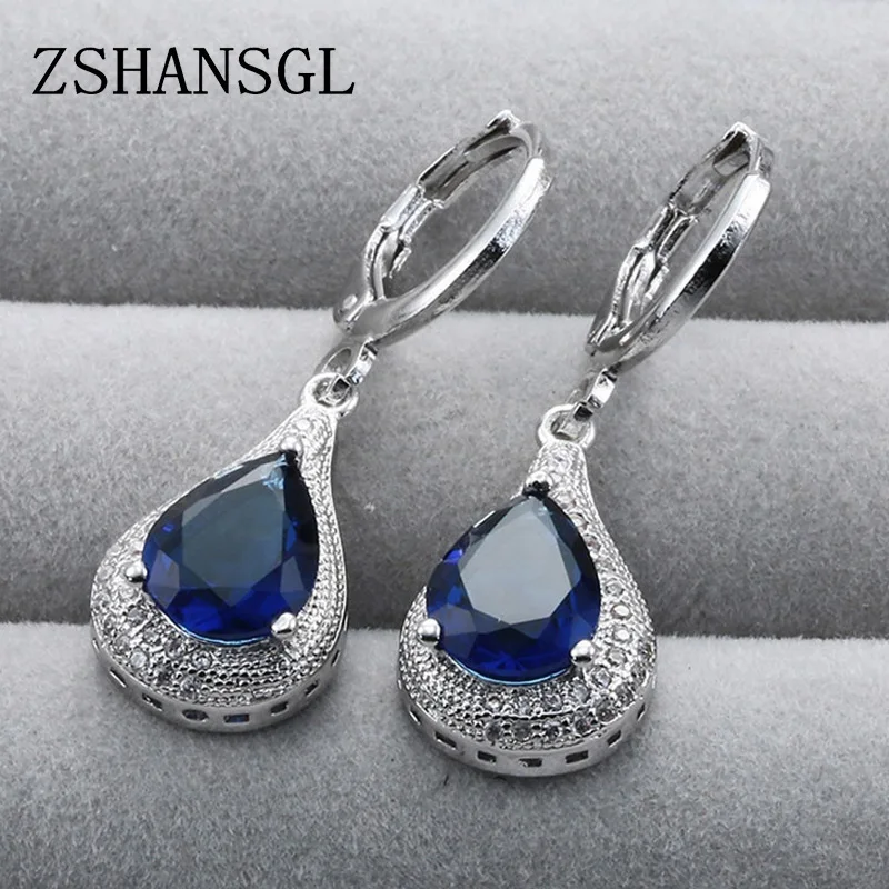 Модные серьги-подвески серебряного цвета с прозрачным кристаллом и голубым