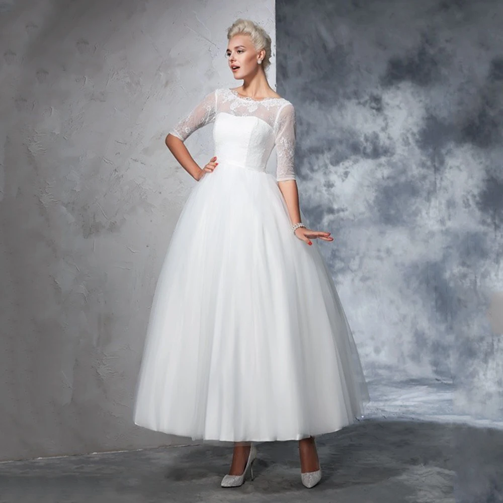 

Короткое бальное платье для свадьбы с коротким рукавом из тюля и кружева с глубоким вырезом Свадебное платье длиной ниже колена на молнии с...