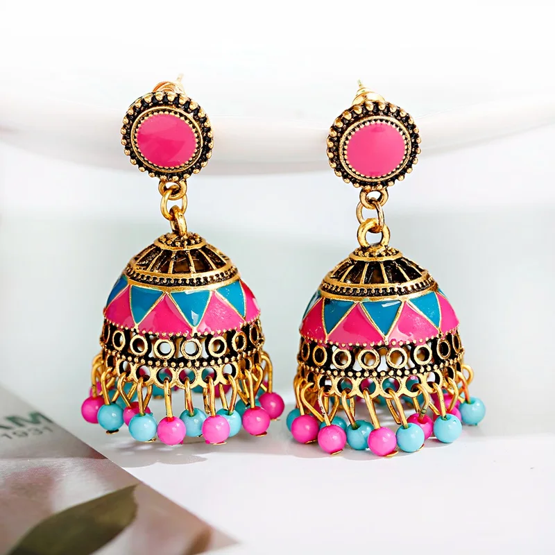 Женские серьги золотого и металлического цвета в индийском