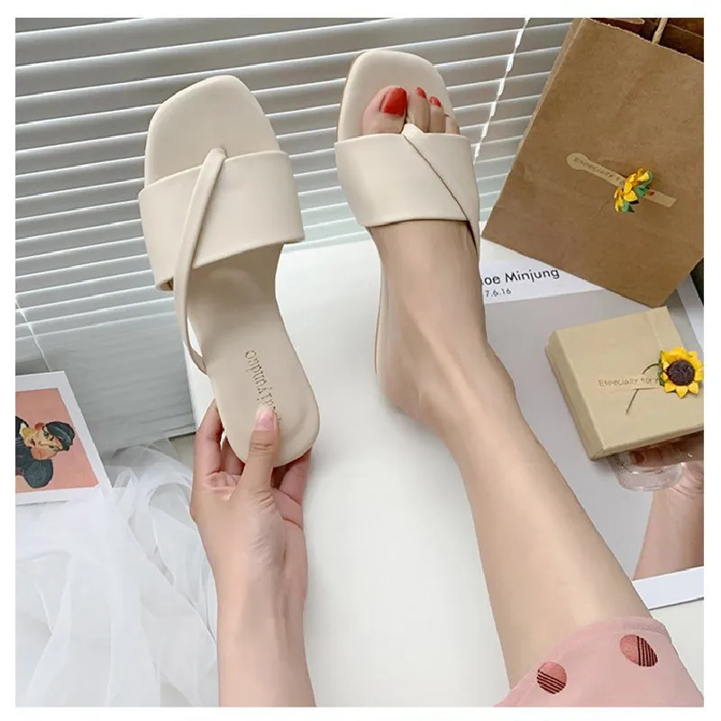

Candy colored slippers for women, flat flat beach slippers, a new style of summer shoes for women, cross flip-flops
