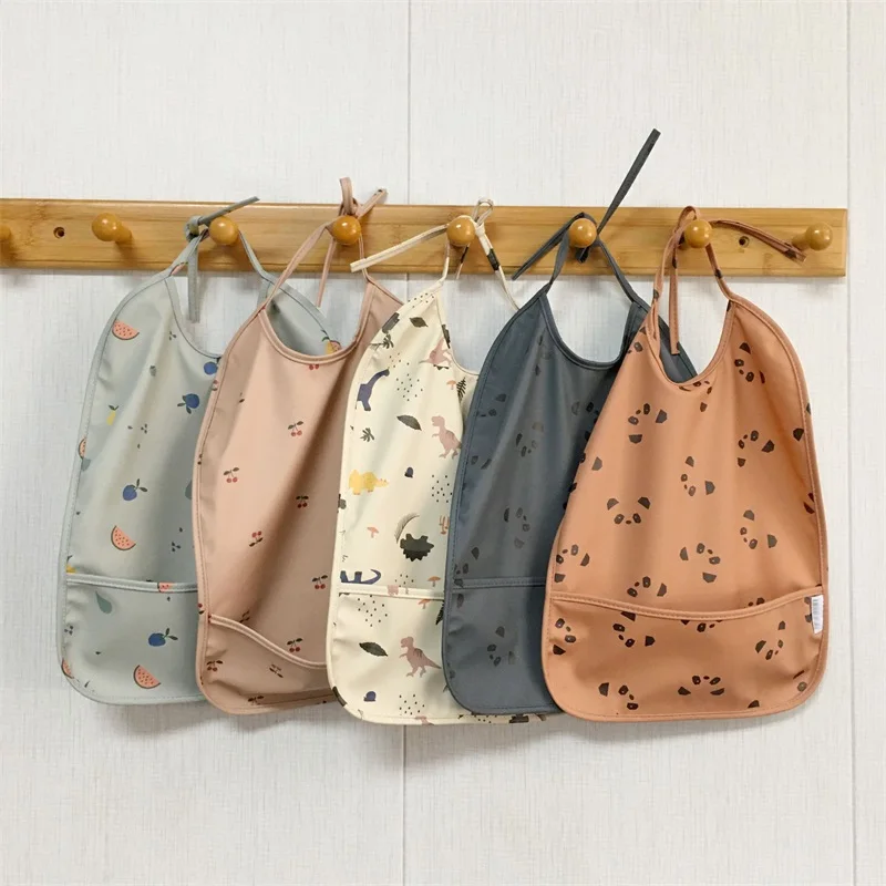 

Baby Bibs Kids Waterproof Feeding ClothUniversal Boys and Girls Burp Cloth Children Cartoon Panda Dinosaur Print Bib