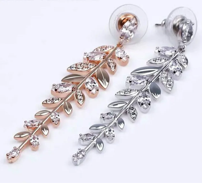 

Женские серьги из розового золота, с листьями