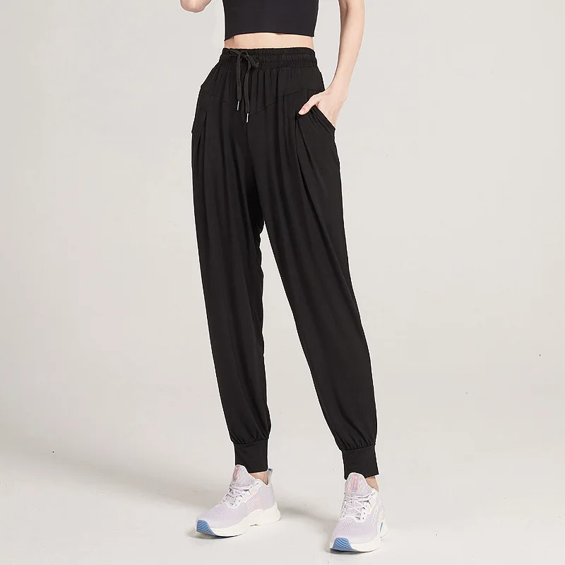 

Quick-Drying Breathable Sports Pants Ladies Yoga Running Fitness Nine-Point Pants Harlan Casual Solid Color Loose Foot Straps