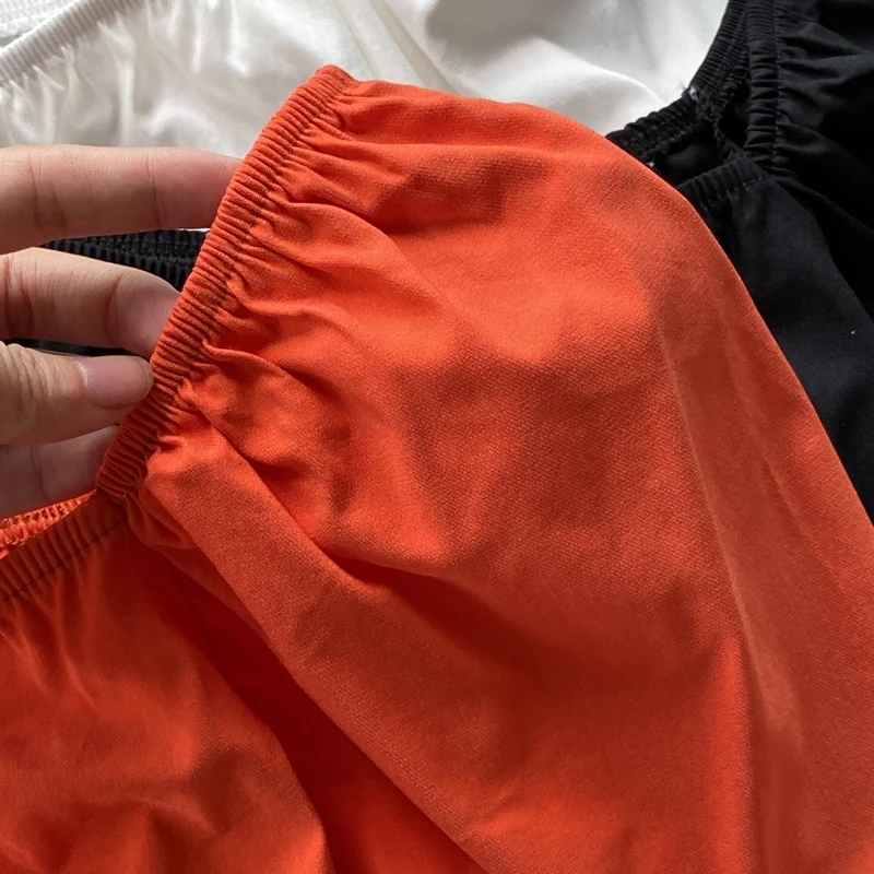 

2021 summer new French style v-neck collarbone western short umbilical top design sense bubble short-sleeved shirt women