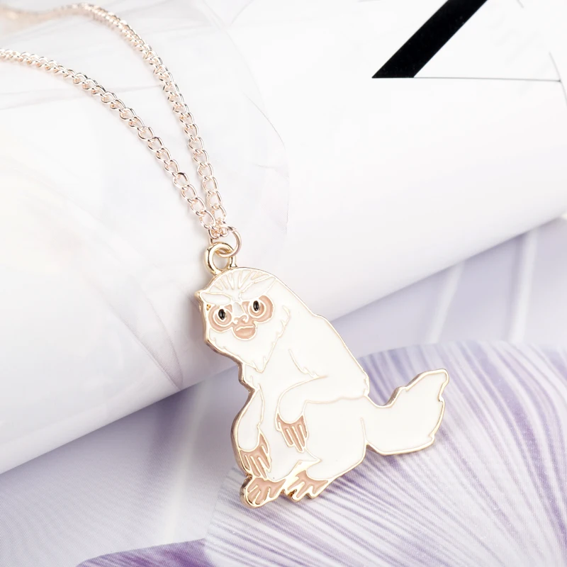 Брелок для ключей с изображением фантастических животных гринделвальда |