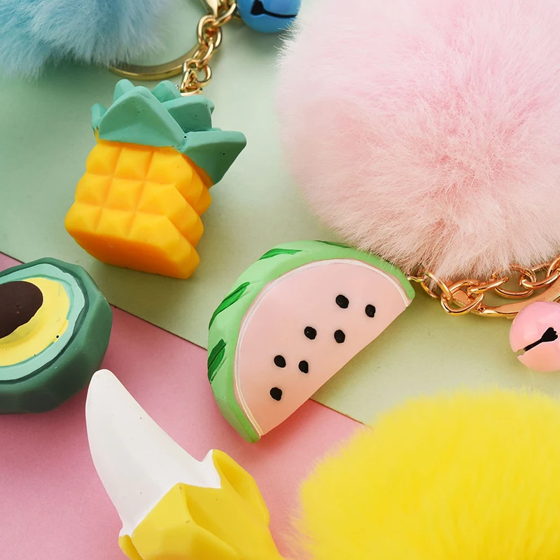

Cute Fluffy Pompom Keychain Women Girl Resin Watermelon Avocado Key Chain Faux Fur Bag Charms Pendant Key Ring Bells Pom Pom New